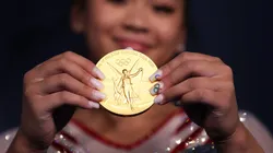 Sunisa Lee of United States poses with her gold medal. (Getty)