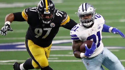 Cameron Heyward of the Pittsburgh Steelers (left) pursuing Ezekiel Elliott of the Dallas Cowboys in Week 9 of the 2020 NFL regular season. (Getty)