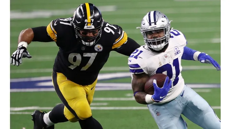 Cameron Heyward of the Pittsburgh Steelers (left) pursuing Ezekiel Elliott of the Dallas Cowboys in Week 9 of the 2020 NFL regular season. (Getty)
