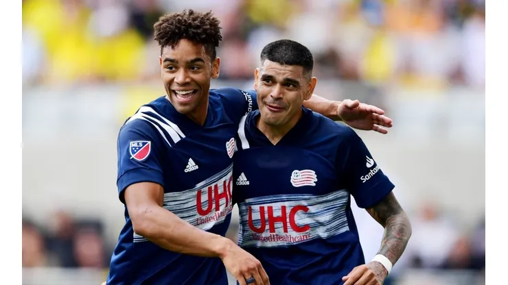 Tajon Buchanan #17 and Gustavo Bou #7 of New England Revolution (Getty)