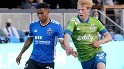 Marcos Lopez (left) of San Jose Earthquakes grabs control of the ball defended by Ethan Dobbelaere (right) of Seattle Sounders. (Getty)