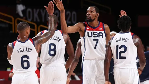 Kevin Durant of United States high-fives teammates. (Getty)
