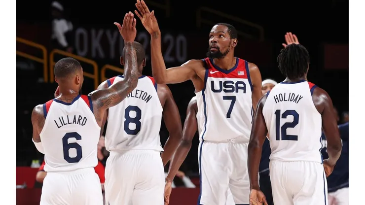 Kevin Durant of United States high-fives teammates. (Getty)