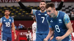 Agustin Loser of Argentina (right) celebrates with teammates. (Getty)
