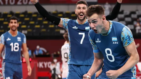 Agustin Loser of Argentina (right) celebrates with teammates. (Getty)