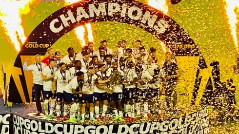 The USMNT players celebrate after winning the 2021 Concacaf Gold Cup.