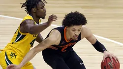 Davion Mitchell guarding Cade Cunningham. (Getty)