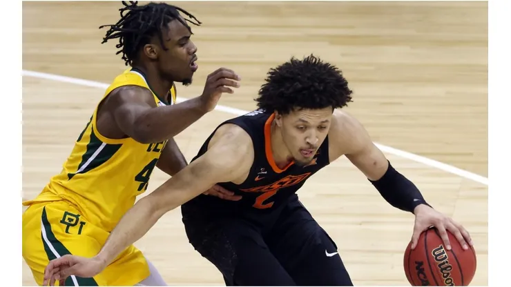 Davion Mitchell guarding Cade Cunningham. (Getty)