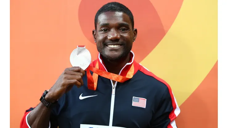Justin Gatlin of the United States poses with a medal. (Getty)