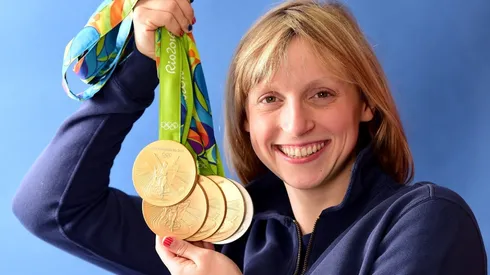Katie Ledecky of the United States poses for a photo with her five medals. (Getty)