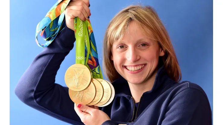 Katie Ledecky of the United States poses for a photo with her five medals. (Getty)