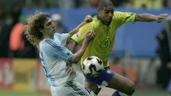 Fabricio Coloccini of Argentina (left) and Adriano of Brazil in the 2005 FIFA Confederations Cup Final. (Getty)
