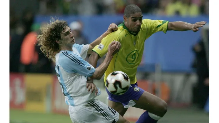 Fabricio Coloccini of Argentina (left) and Adriano of Brazil in the 2005 FIFA Confederations Cup Final. (Getty)