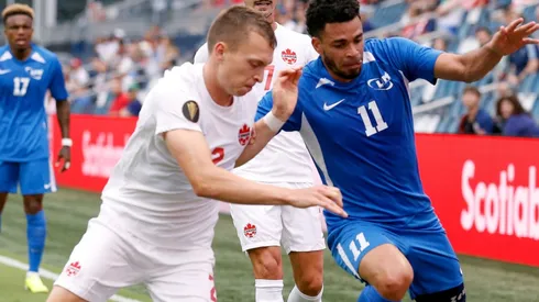 Alistair Johnston of Canada (left) and Emmanuel Riviere of Martinique (Getty).