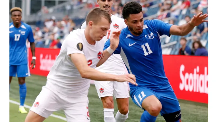 Alistair Johnston of Canada (left) and Emmanuel Riviere of Martinique (Getty).