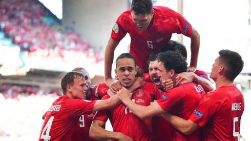 Denmark national team celebrate after scoring a goal. (Getty)