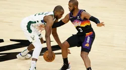 Chris Paul guarding Khris Middleton. (Getty)