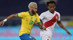 Neymar of Brazil (left) and André Carrillo of Peru (Getty).