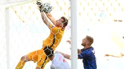 Martin Dubravka of Slovakia (left) scores an own goal. (Getty)