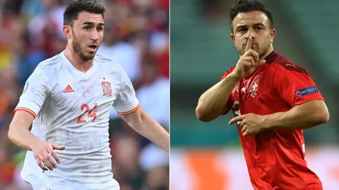 Ameryc Laporte of Spain (left) and Xherdan Shaquiri (Getty).