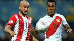 Carlos González of Paraguay and Renato Tapia of Peru. (Getty)