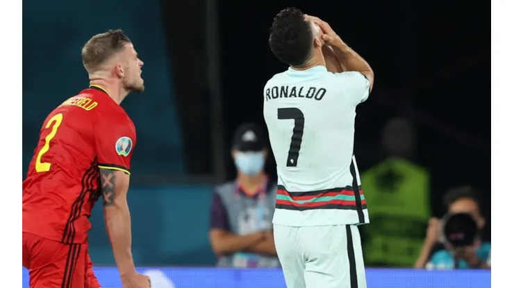Cristiano Ronaldo of Portugal (right) looks dejected after defeat to Belgium. (Getty)