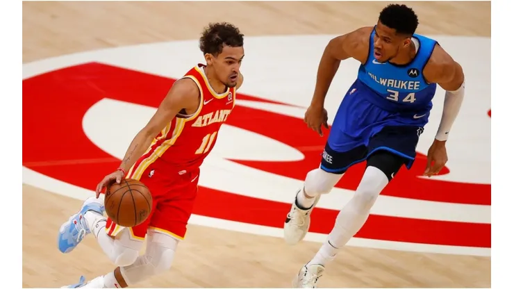 Giannis Antetokounmpo guarding Trae Young. (Getty)