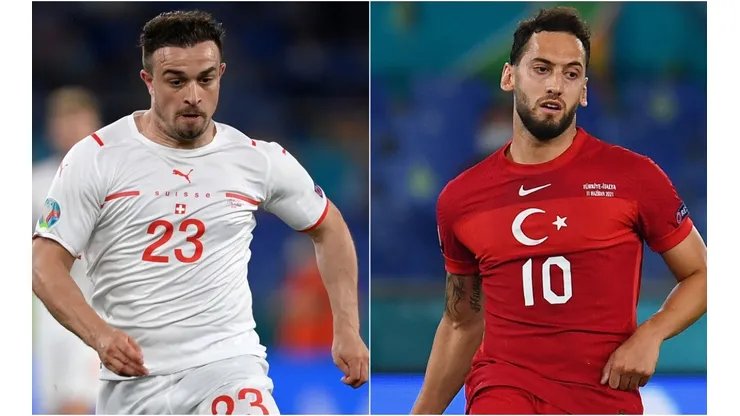 Xherdan Shaqiri of Switzerland (left) and Hakan Calhanoglu of Turkey (right). (Getty)