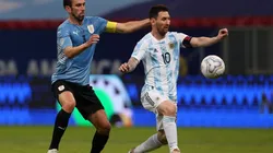 Lionel Messi of Argentina and Diego Godin of Uruguay compete for the ball (Getty).