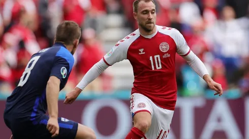 Christian Eriksen of Denmark runs with the ball against Finland. (Getty)