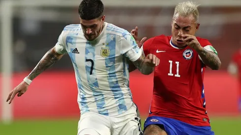 Rodrigo De Paul of Argentina (left) and Eduardo Vargas of Chile (Getty).
