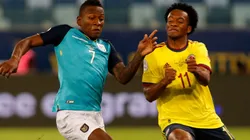Pervis Estupiñán of Ecuador (left) and Juan Cuadrado of Colombia (Getty).