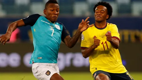 Pervis Estupiñán of Ecuador (left) and Juan Cuadrado of Colombia (Getty).