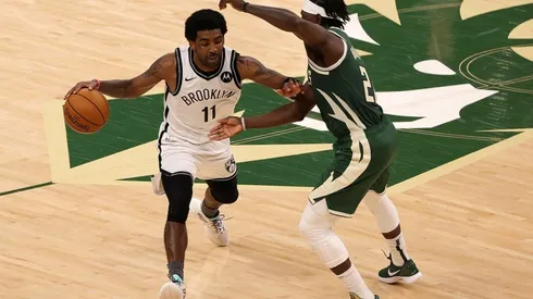 Kyrie Irving vs. Jrue Holiday. (Getty)