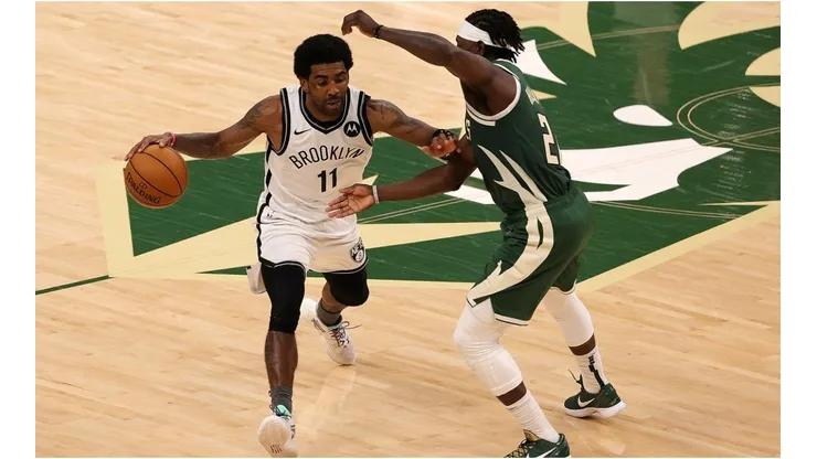 Kyrie Irving vs. Jrue Holiday. (Getty)