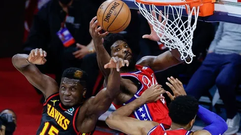 Joel Embiid scores over Clint Capela. (Getty)