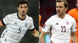 Mats Hummels of Germany (left) and Kriss Karklins of Latvia (right). (Getty)