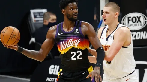 Deandre Ayton & Nikola Jokic. (Getty)