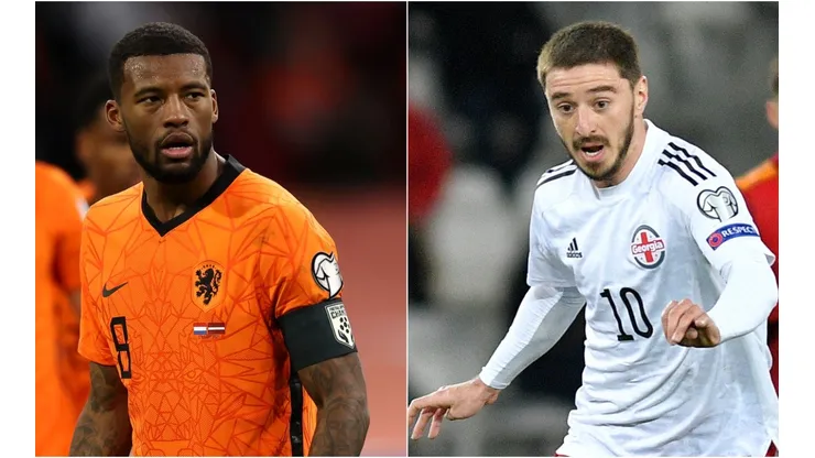 Georginio Wijnaldum of Netherlands (left) and Otar Kiteishvili of Georgia (right). (Getty)