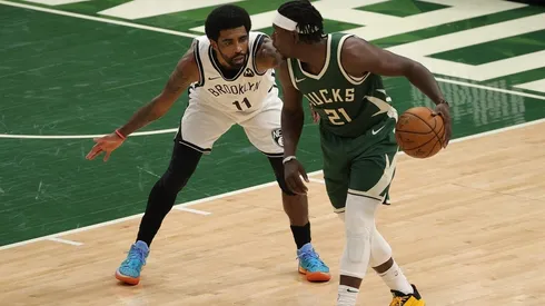 Jrue Holiday & Kyrie Irving. (Getty)