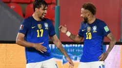 Lucas Paquetá of Brazil celebrates with teammate Neymar after scoring against Paraguay (Getty).