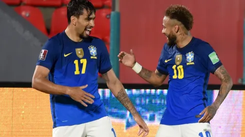 Lucas Paquetá of Brazil celebrates with teammate Neymar after scoring against Paraguay (Getty).