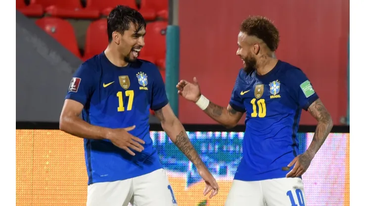 Lucas Paquetá of Brazil celebrates with teammate Neymar after scoring against Paraguay (Getty).