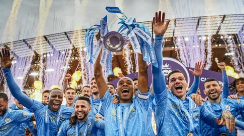 Manchester City players lift the 2020-21 Premier League Trophy. (Getty)