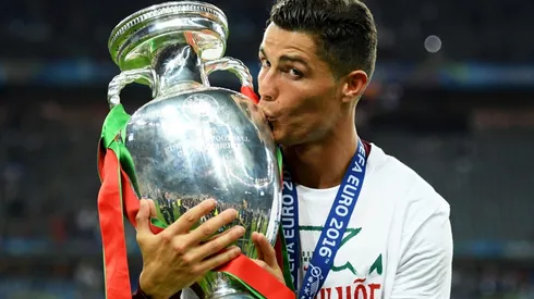 Cristiano Ronaldo of Portugal kisses the Euro 2016 trophy. (Getty)
