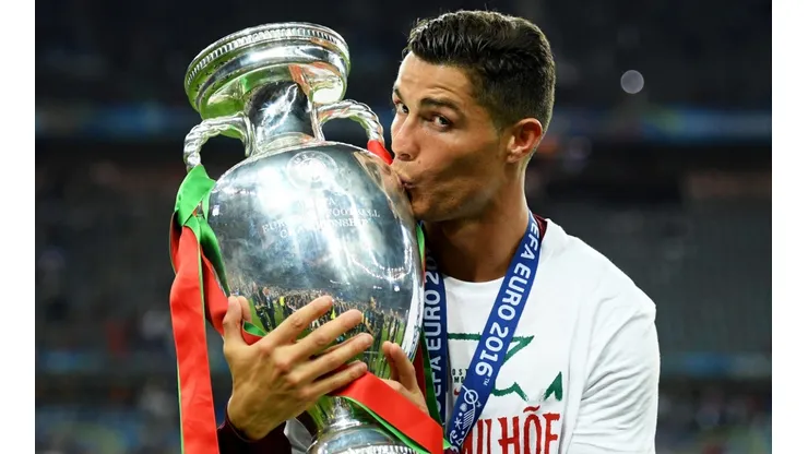 Cristiano Ronaldo of Portugal kisses the Euro 2016 trophy. (Getty)