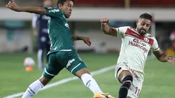 Marcos Rocha (left) of Palmeiras competes for the ball with Luis Urruti (right) of Universitario. (Getty)