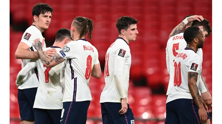 England players celebrate after a goal. (Getty)