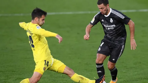 Eden Hazard of Real Madrid (right) is challenged by Manu Trigueros of Villarreal (left). (Getty)