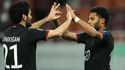 Serge Gnabry (right) of Germany celebrates with team mate Ilkay Gundogan (left). (Getty).jpg